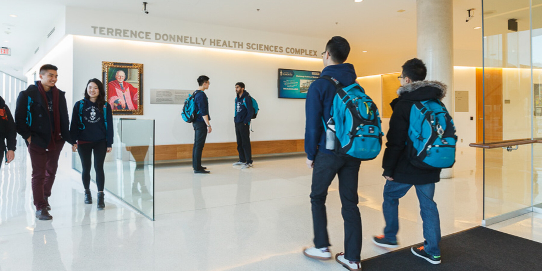Students walk through the Terrence Donnelly Health Sciences Complex.